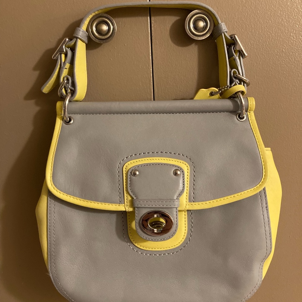 Coach Gray with yellow accents.Dual strap like new.